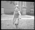 Student in front of Building by Fred A. Blocker