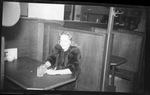 Student Sitting in Booth by Fred A. Blocker