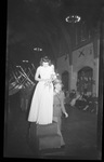Student with Flowers at Military Ball in Perry Hall Cafeteria by Fred A. Blocker