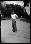 Student Posing in Street by Fred A. Blocker