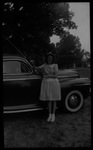 Student Standing Beside Car by Fred A. Blocker