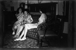 Students Sitting on Couch by Fred A. Blocker