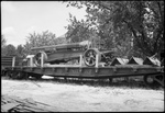 Piece of Artillery on Open Train Car by Fred A. Blocker
