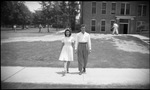 Student Couple Walking to Class by Fred A. Blocker