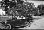 Students in Convertible Car Stopped Talking to Friends by Fred A. Blocker