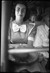 Woman Sitting on a Bus by Fred A. Blocker