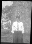 Student Standing in front of Tree by Fred A. Blocker
