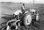 Man on Tractor by Fred A. Blocker