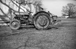 Tractor in front of Barn by Fred A. Blocker