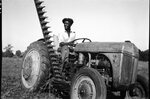 Man on Tractor by Fred A. Blocker
