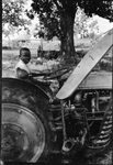 Boy on Tractor by Fred A. Blocker