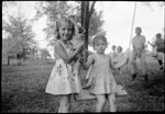 Girls Playing on Swing by Fred A. Blocker