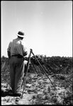 Men Surveying Tilled Field by Fred A. Blocker