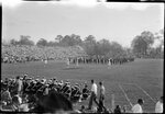 Marching Band on Football Field by Fred A. Blocker