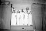 Girls Dressed as Angels on Stage by Fred A. Blocker