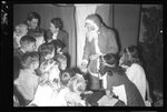 Children Gathered Around Santa Claus by Fred A. Blocker