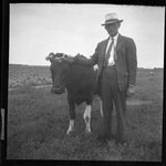 Man with Cow by Fred A. Blocker
