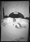 Baby on Bed by Fred A. Blocker