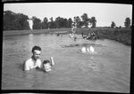 Man Helping Boy to Swim by Fred A. Blocker
