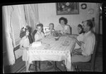 Family at Dinner Table by Fred A. Blocker