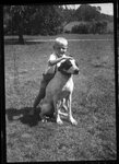 Boy with Dog by Fred A. Blocker
