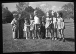 Children Standing in a Row by Fred A. Blocker