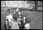 Children Huddling Together by Fred A. Blocker