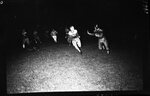 Football Players Mid-Play by Fred A. Blocker