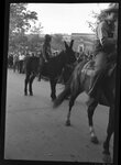 Man Riding Donkey in Parade by Fred A. Blocker