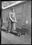Man in front of Shed by Fred A. Blocker