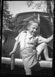 Boy in front of Car by Fred A. Blocker