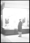 Man Looking in Shop Window by Fred A. Blocker