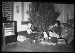 Children Playing Under Christmas Tree by Fred A. Blocker