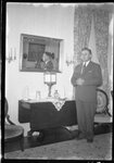 Man Posing in Living Room by Fred A. Blocker