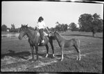 Woman on Horse with Foal by Fred A. Blocker
