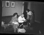 Man Opening Gift by Fred A. Blocker