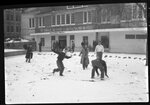 Snowball Fight Outside College Grill by Fred A. Blocker