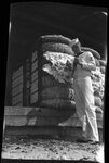 Man with Cotton Bales by Fred A. Blocker