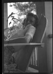 Woman in Adirondack Chair by Fred A. Blocker