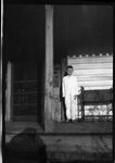 Boy Posing on Porch by Fred A. Blocker
