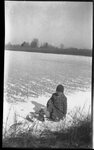 Child Sitting in Snow by Fred A. Blocker