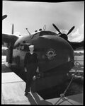 Man Posing with Transport Plane by Fred A. Blocker