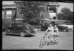 Women on Tandem Bike by YMCA by Fred A. Blocker
