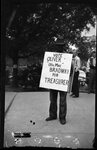 Man Wearing Campaign Sign by Fred A. Blocker