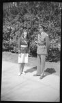 Man and Woman in Military Uniform by Fred A. Blocker