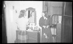 Students Getting Ready in Dorm Room by Fred A. Blocker