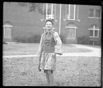 Student in front of Building by Fred A. Blocker