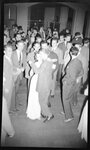 Couple Dancing in Crowd by Fred A. Blocker