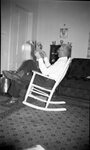 Man Relaxing in Rocking Chair by Fred A. Blocker