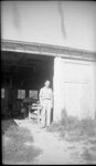 Man in Open Barn Door by Fred A. Blocker